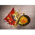 Easy Goreng spice arranged in Asian-stylemix with chopsticks, bamboo mat and ingredients such as garlic and ginger, and a bowl of fried noodles and vegetables on a grey background. 