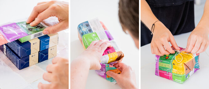 Teebeutelhüllen Geschenkpapier | © SONNENTOR Auf dem Foto sieht man wie etwas mit dem Teebeutelhüllen Papier eingepackt wird. | © SONNENTOR